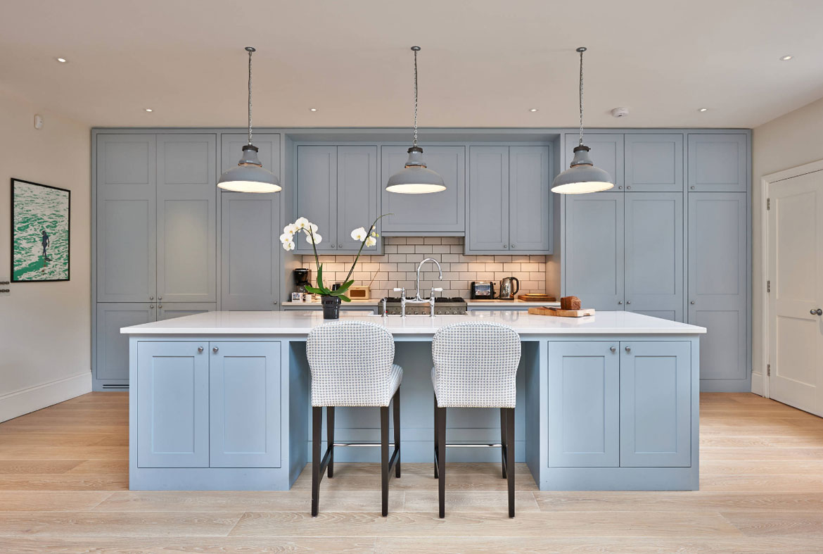 light gray and blue kitchen cabinet