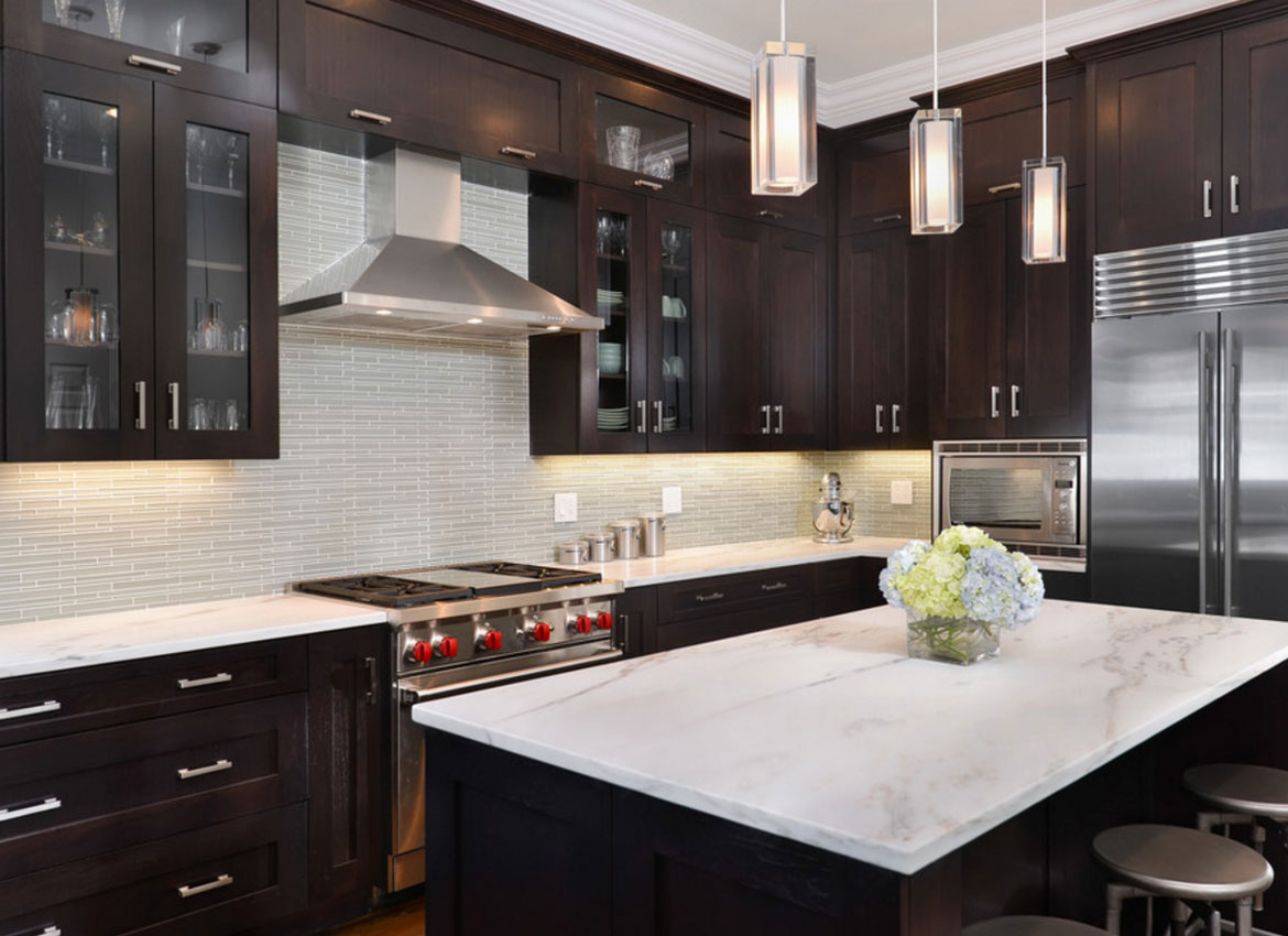 modern dark kitchen cabinet with light countertops