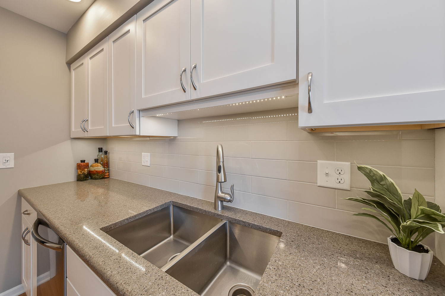 White Cabinets, Modern Clean Grey Paint, Subway Tile, Stainless Appliances - Sebring Design Build