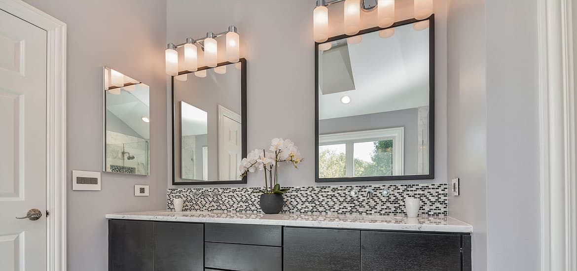 Featured image of post Double Sink Vanity With One Mirror - Soaring mirrors draw the eye to this peaked ceiling.