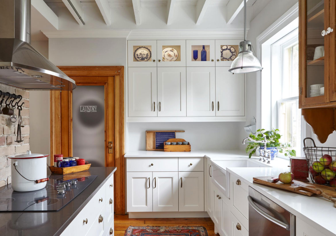 white kitchen with light brown cabinet