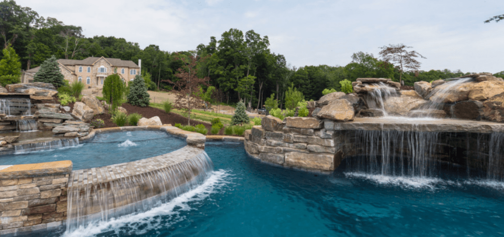 41 Swimming Pool Waterfall Ideas, How Much Is An Inground Pool With Waterfall