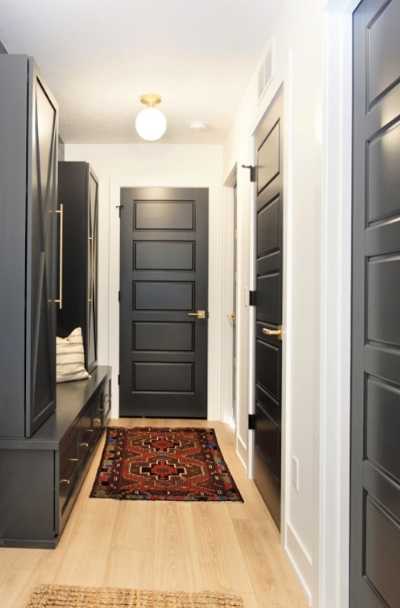 black interior doors with wood trim