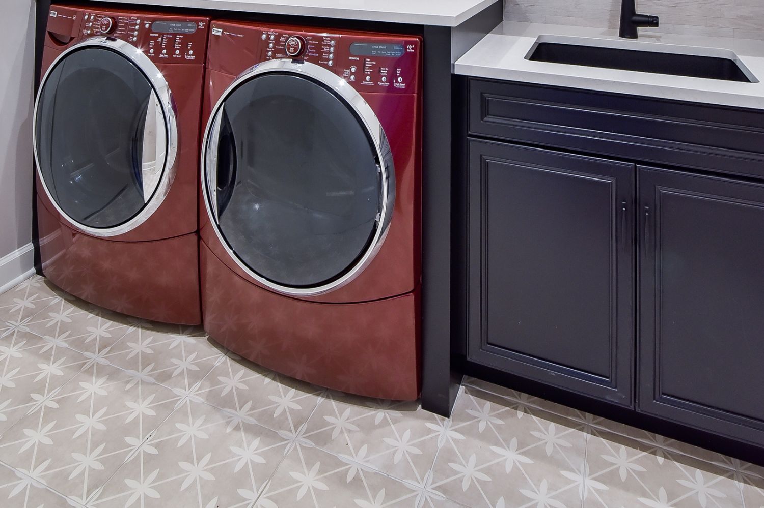 Naperville-Laundry-White-Cabinetry-Dark-Cabinets-Floor-Tiles-1_Sebring-Design-Build